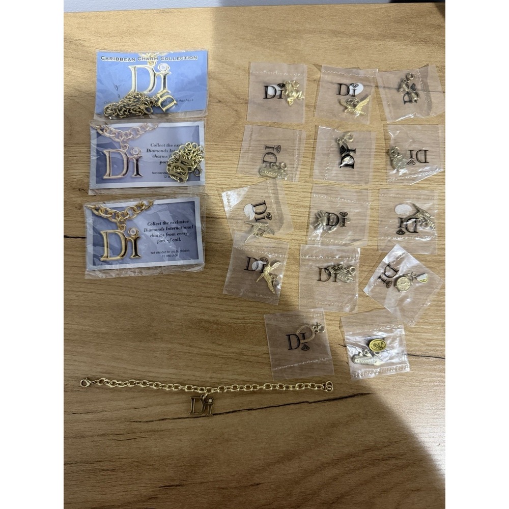 Di DIAMONDS INTERNATIONAL CHARMS BRACELET Jewelry Cruise Caribbean Sealed LOT 17